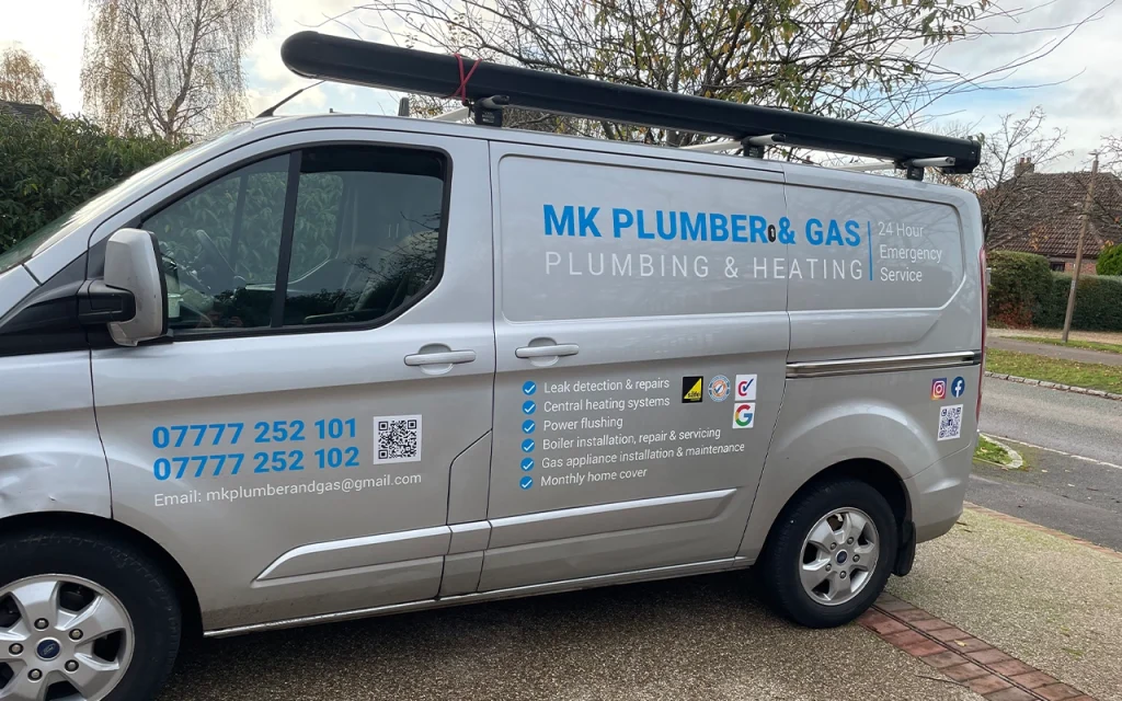 MK Plumber & Gas branded company van