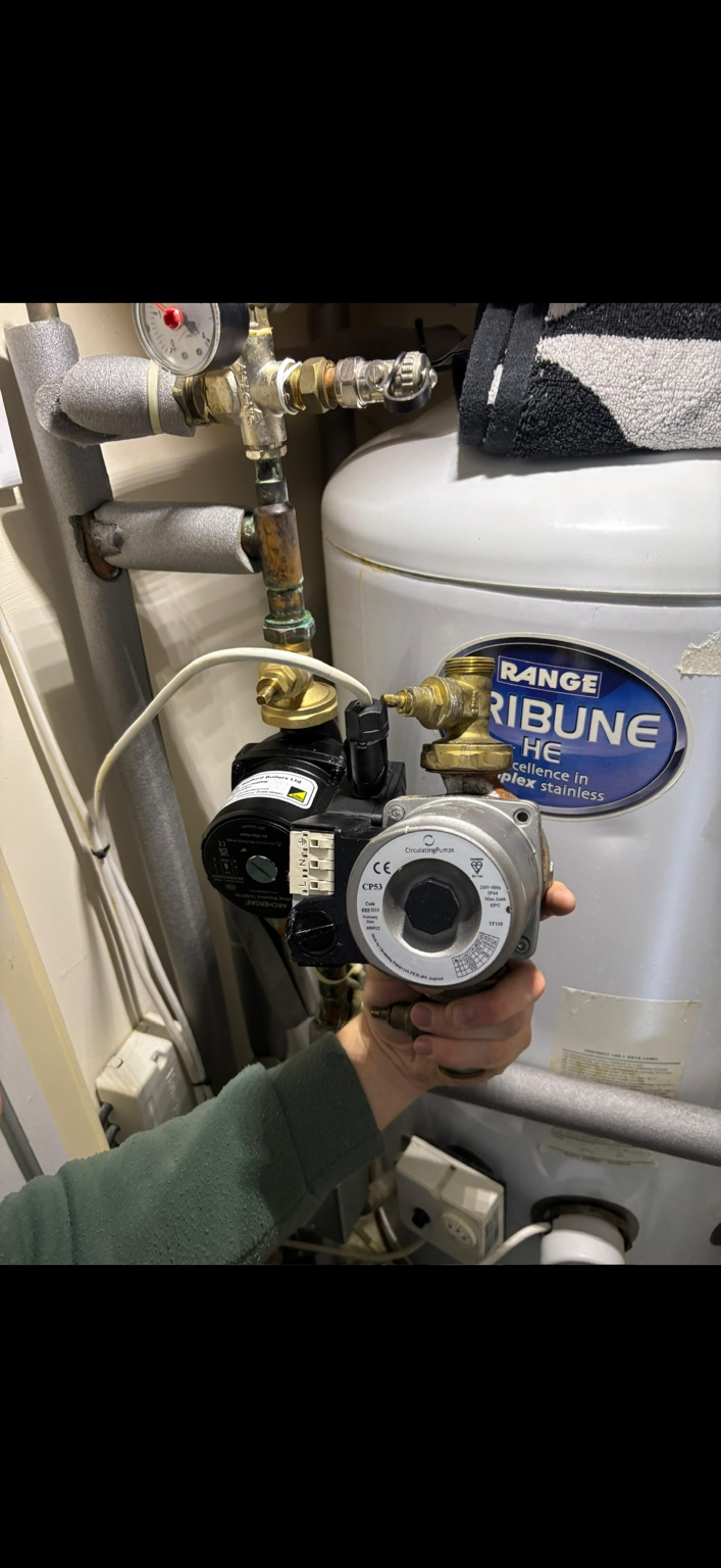 Heating circulation pump and hot water cylinder pipework